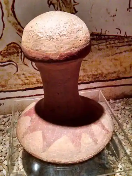 Phalli with solar disc design at the bottom